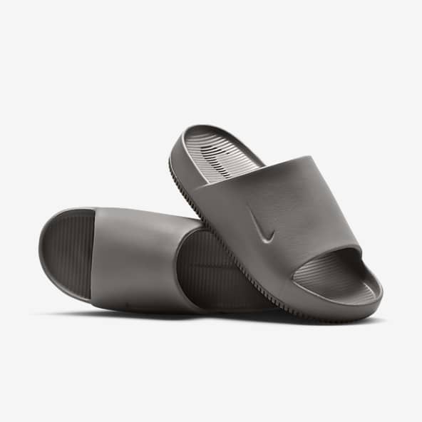 Nike grey sliders hotsell